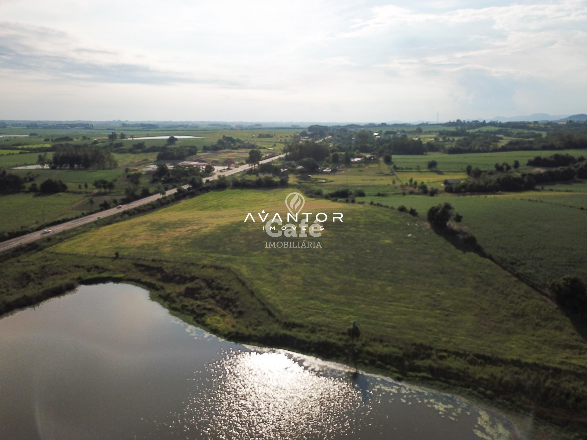 Terreno com vista para área rural e lagoa — Terreno à venda em Zona rural, Restinga Seca/RS